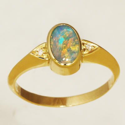 18k Yellow Gold Ring with two diamonds and a BLACK OPAL Sparkling bright orange and green over blue